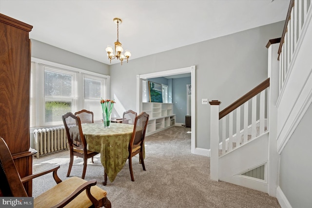 1865 Marshall, Norristown, PA 19403 - dining space featuring radiator, a chandelier, stairs, light carpet, and baseboards