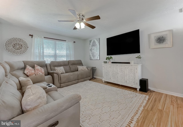 26055 Prospect Hill Rd, Mechanicsville, MD 20659 - living area with baseboards, a ceiling fan, and wood finished floors
