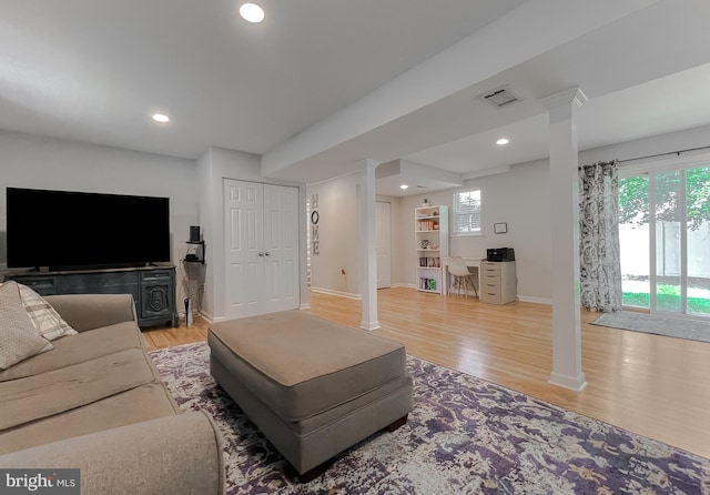 26055 Prospect Hill Rd, Mechanicsville, MD 20659 - living area with decorative columns, light wood-type flooring, baseboards, and recessed lighting