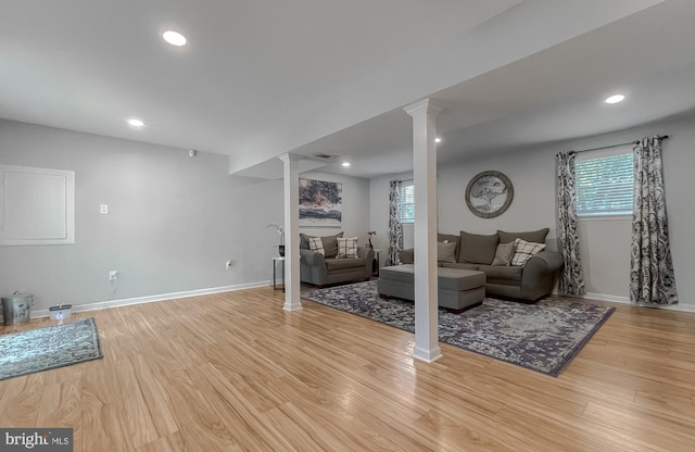 26055 Prospect Hill Rd, Mechanicsville, MD 20659 - living area featuring ornate columns, plenty of natural light, light wood finished floors, baseboards, and recessed lighting