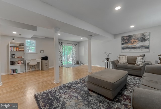 26055 Prospect Hill Rd, Mechanicsville, MD 20659 - living area with decorative columns, light wood-type flooring, recessed lighting, a desk, and baseboards