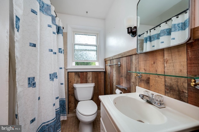 328 W Summit St, Mohnton, PA 19540 - full bath with toilet, wainscoting, vanity, tile patterned floors, and tile walls