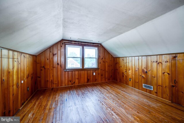 328 W Summit St, Mohnton, PA 19540 - additional living space featuring lofted ceiling, wood-type flooring, and wood walls