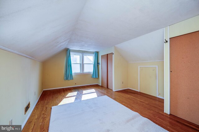 328 W Summit St, Mohnton, PA 19540 - bonus room with wood finished floors, vaulted ceiling, and baseboards