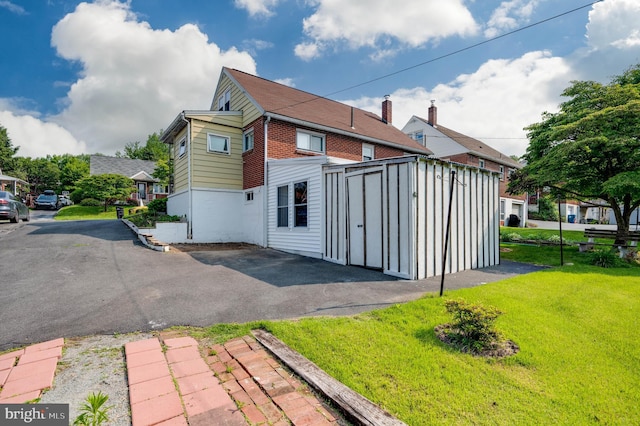 328 W Summit St, Mohnton, PA 19540 - back of property featuring a yard and brick siding