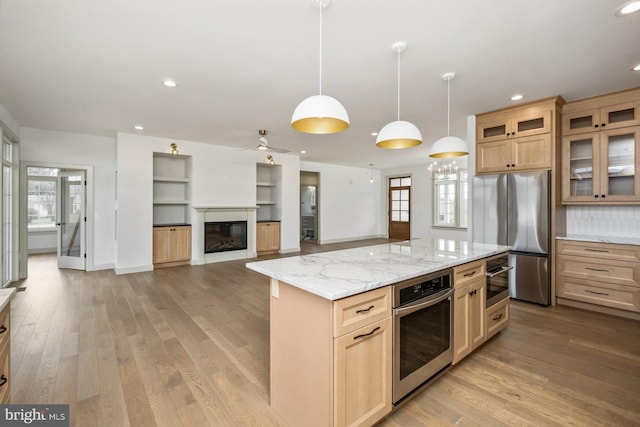 135 Radnor Ct, Rockingham, VA 22801 - kitchen featuring appliances with stainless steel finishes, plenty of natural light, light wood-style floors, and recessed lighting