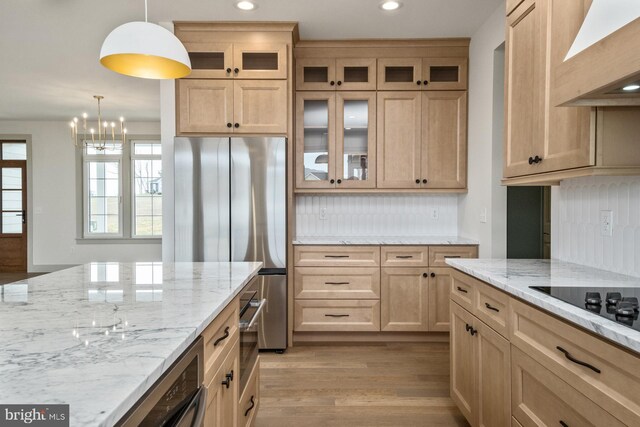 135 Radnor Ct, Rockingham, VA 22801 - kitchen featuring freestanding refrigerator, extractor fan, light wood-style floors, light stone countertops, and recessed lighting