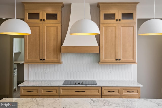 135 Radnor Ct, Rockingham, VA 22801 - kitchen with black electric stovetop, tasteful backsplash, light stone counters, and glass insert cabinets