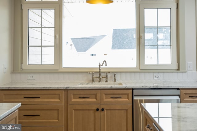 135 Radnor Ct, Rockingham, VA 22801 - kitchen with dishwasher, a sink, plenty of natural light, and light stone counters