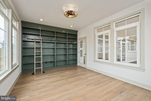 135 Radnor Ct, Rockingham, VA 22801 - empty room featuring light wood-type flooring, healthy amount of natural light, baseboards, recessed lighting, and built in shelves