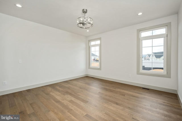 135 Radnor Ct, Rockingham, VA 22801 - unfurnished room featuring a chandelier, wood finished floors, recessed lighting, and baseboards