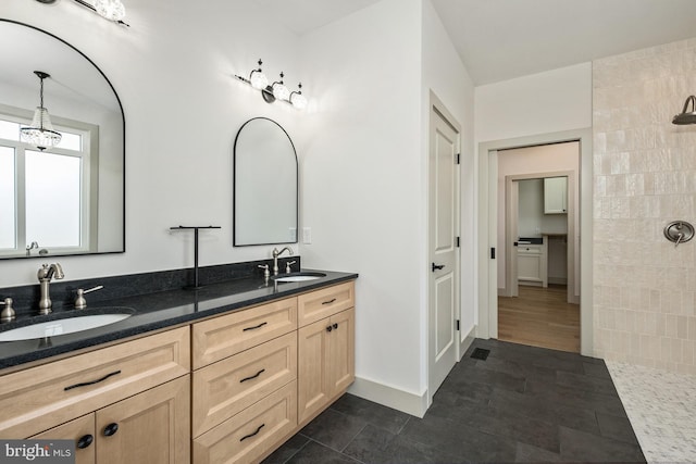 135 Radnor Ct, Rockingham, VA 22801 - bathroom featuring double vanity, tiled shower, a chandelier, and tile patterned flooring