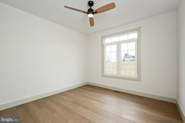 135 Radnor Ct, Rockingham, VA 22801 - spare room featuring ceiling fan, baseboards, and wood-type flooring