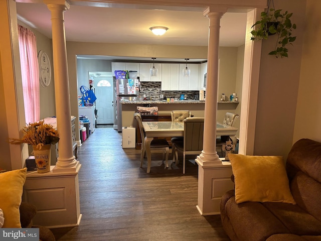 632 Bath Rd, Bristol, PA 19007 - dining space with ornate columns and dark wood-type flooring