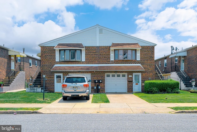 7911 Farnsworth St, Philadelphia, PA 19152 - view of front of home featuring an attached garage, brick siding, concrete driveway, and a front lawn