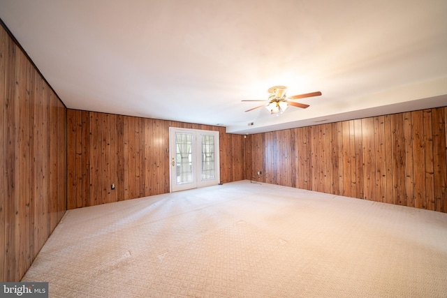 7911 Farnsworth St, Philadelphia, PA 19152 - empty room with wood walls, carpet, and ceiling fan