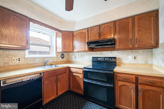 7911 Farnsworth St, Philadelphia, PA 19152 - kitchen with black appliances, under cabinet range hood, a sink, ceiling fan, and brown cabinets