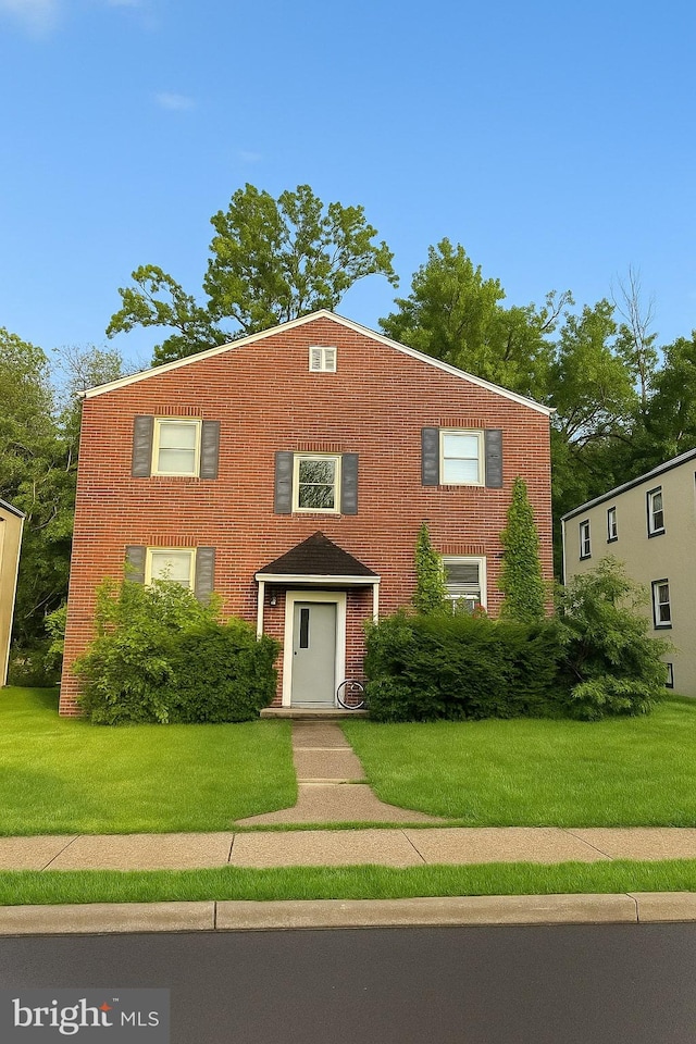350-360 Concord Ave, Ewing, NJ 08618 - view of front of house with a front yard and brick siding