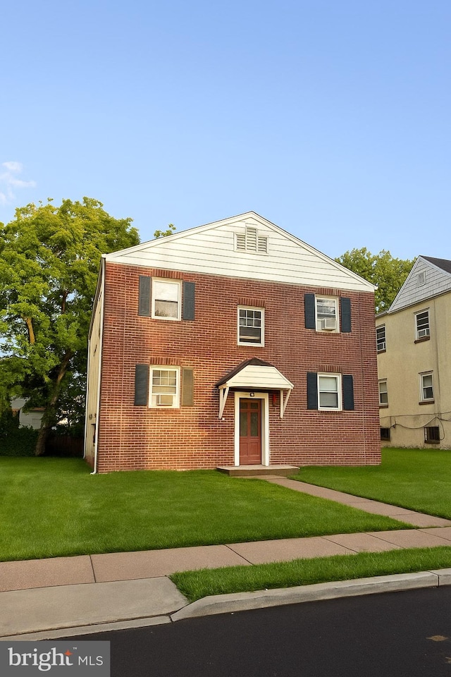 350-360 Concord Ave, Ewing, NJ 08618 - traditional-style house with a front yard and brick siding