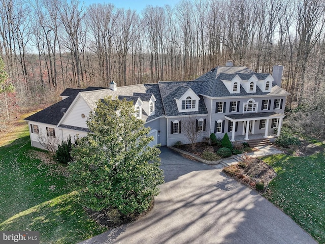 1637 Cold Bottom Rd, Sparks Glencoe, MD 21152 - view of front facade featuring driveway, a chimney, and a porch