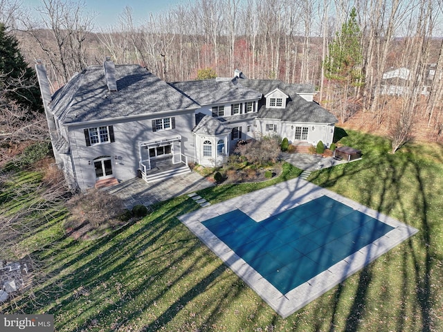 1637 Cold Bottom Rd, Sparks Glencoe, MD 21152 - rear view of property with a chimney, a yard, a covered pool, and a patio area