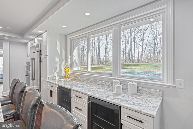 1637 Cold Bottom Rd, Sparks Glencoe, MD 21152 - bar with wine cooler, recessed lighting, dark wood finished floors, and baseboards