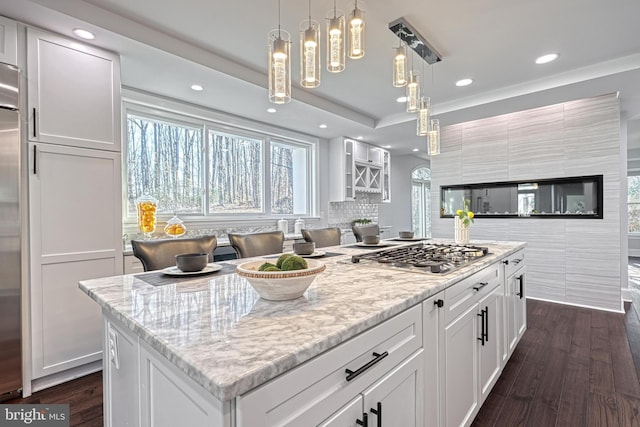 1637 Cold Bottom Rd, Sparks Glencoe, MD 21152 - kitchen with stainless steel gas stovetop, a kitchen island, white cabinetry, dark wood finished floors, and recessed lighting