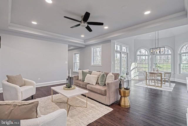 1637 Cold Bottom Rd, Sparks Glencoe, MD 21152 - living area with a tray ceiling, healthy amount of natural light, baseboards, a ceiling fan, and crown molding