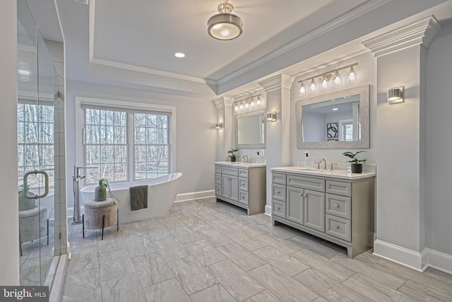 1637 Cold Bottom Rd, Sparks Glencoe, MD 21152 - full bathroom featuring healthy amount of natural light, two vanities, a freestanding tub, baseboards, and crown molding