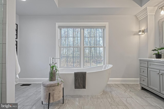1637 Cold Bottom Rd, Sparks Glencoe, MD 21152 - full bath featuring baseboards, vanity, a freestanding bath, and healthy amount of natural light