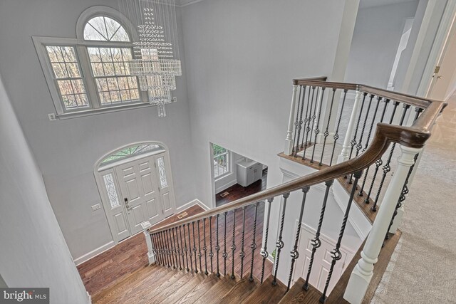 1637 Cold Bottom Rd, Sparks Glencoe, MD 21152 - stairway with a chandelier, wood finished floors, baseboards, and a towering ceiling