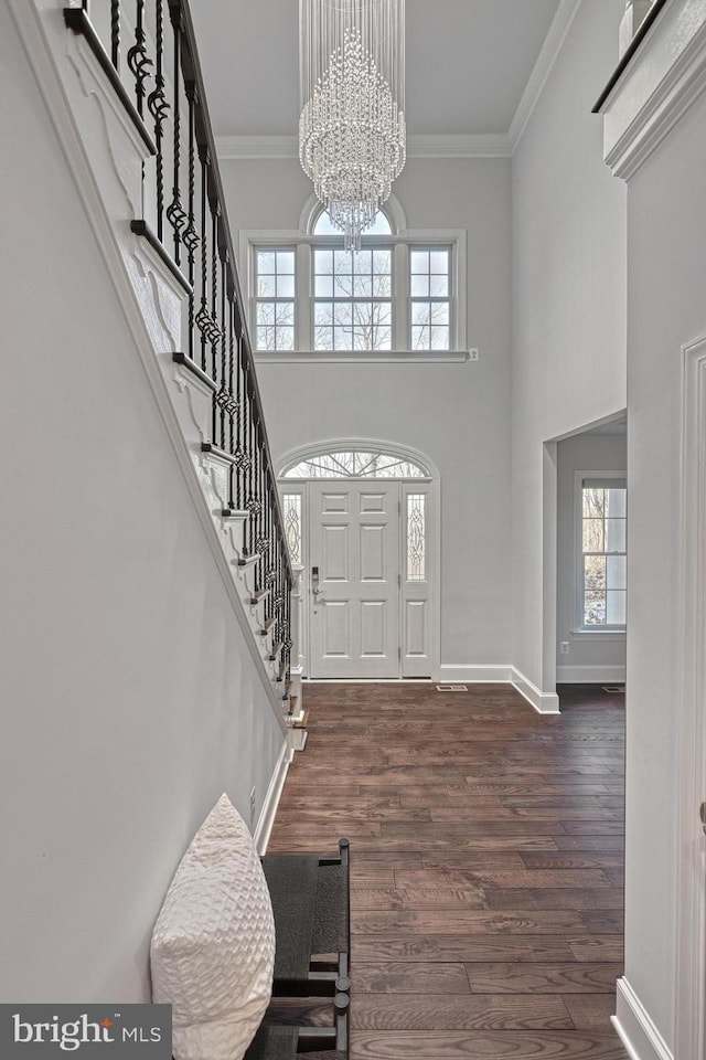 1637 Cold Bottom Rd, Sparks Glencoe, MD 21152 - entrance foyer featuring a chandelier, crown molding, dark wood-style flooring, stairway, and baseboards