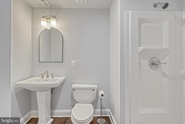 1637 Cold Bottom Rd, Sparks Glencoe, MD 21152 - full bath with baseboards, a shower, wood finished floors, and toilet