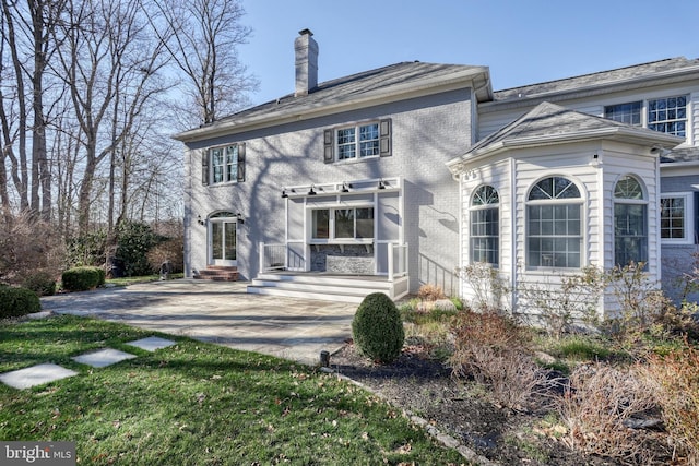 1637 Cold Bottom Rd, Sparks Glencoe, MD 21152 - rear view of house featuring a chimney, brick siding, and a patio