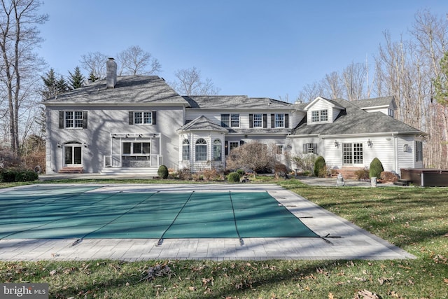 1637 Cold Bottom Rd, Sparks Glencoe, MD 21152 - rear view of house with a covered pool, a chimney, and a yard