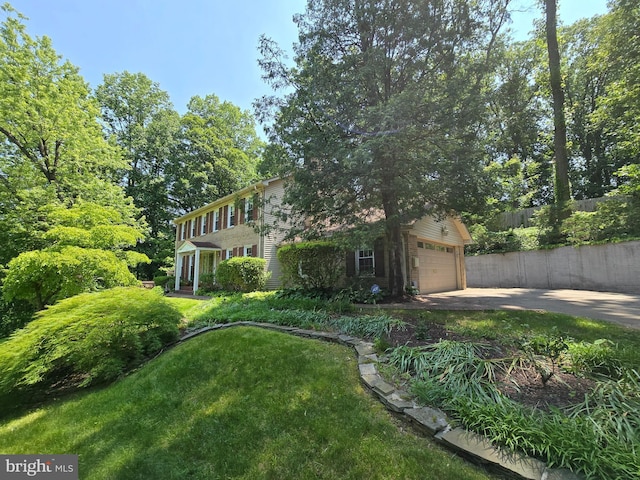 1519 N Chambliss St, Alexandria, VA 22312 - view of front facade with driveway and an attached garage