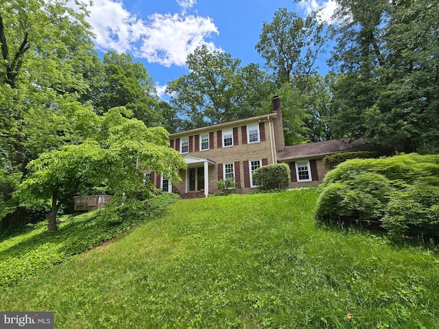 1519 N Chambliss St, Alexandria, VA 22312 - colonial inspired home with a chimney and a front lawn