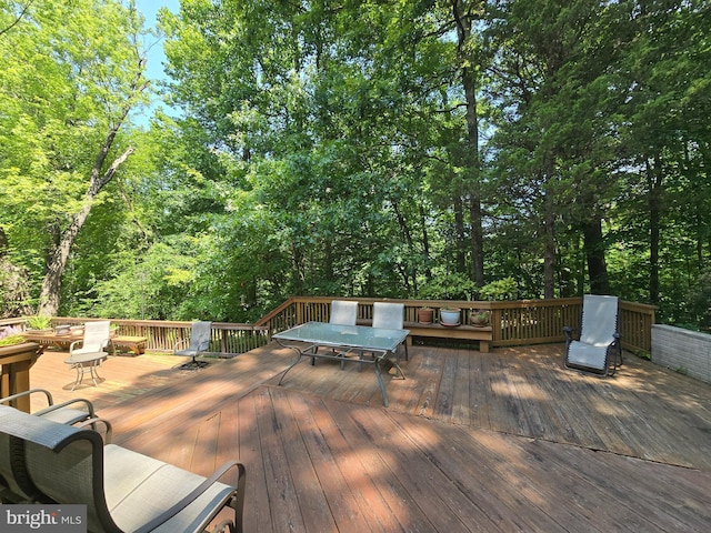 1519 N Chambliss St, Alexandria, VA 22312 - wooden terrace with outdoor dining area and a view of trees