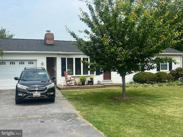 16208 Spade Rd, Hagerstown, MD 21740 - view of front facade with an attached garage, a chimney, a front yard, driveway, and roof with shingles