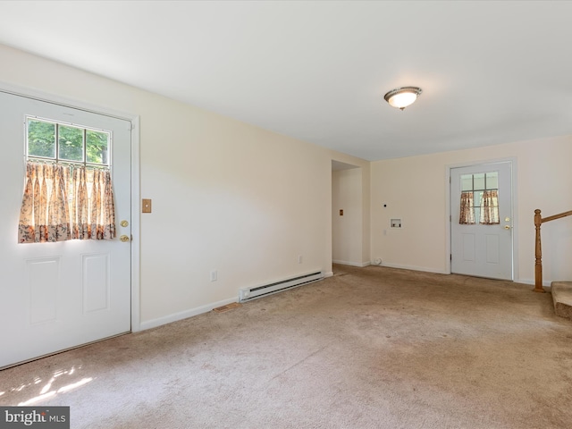 310 Bethel Rd, Paw Paw, WV 25434 - foyer entrance with a baseboard heating unit, plenty of natural light, and carpet floors