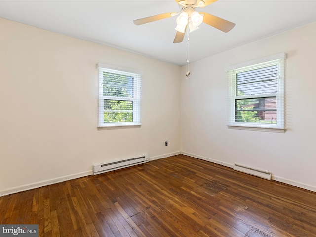 310 Bethel Rd, Paw Paw, WV 25434 - empty room with a baseboard radiator, baseboard heating, plenty of natural light, and wood-type flooring