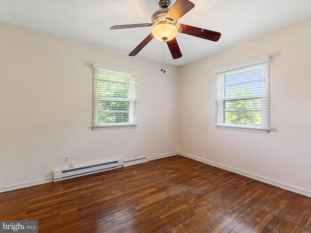 310 Bethel Rd, Paw Paw, WV 25434 - spare room with baseboard heating, wood-type flooring, and baseboards