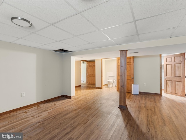 310 Bethel Rd, Paw Paw, WV 25434 - finished basement featuring a paneled ceiling, light wood finished floors, and baseboards