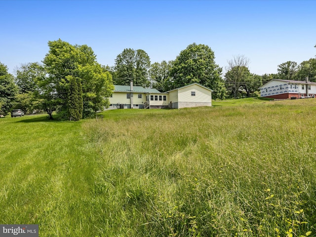 310 Bethel Rd, Paw Paw, WV 25434 - view of yard with view of wooded area