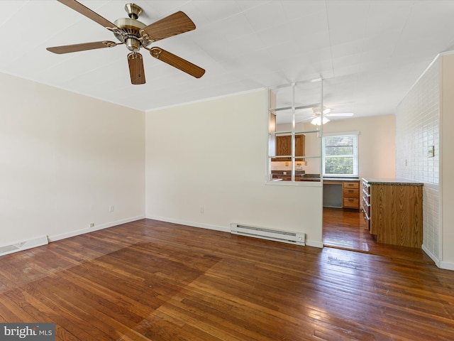 310 Bethel Rd, Paw Paw, WV 25434 - unfurnished living room with a baseboard radiator, a ceiling fan, dark wood finished floors, baseboards, and crown molding