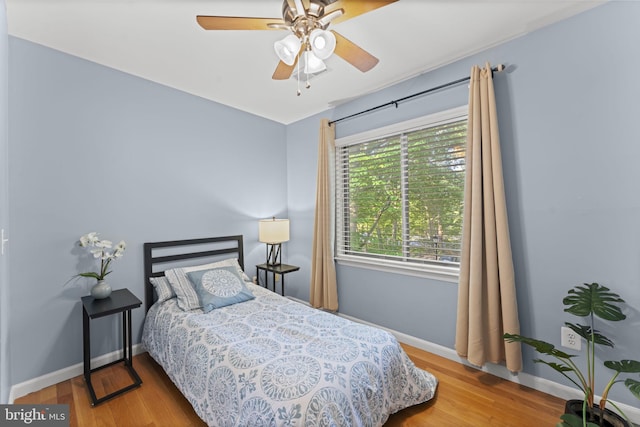 11866 S Lakes Ct, Reston, VA 20191 - bedroom featuring wood finished floors and ceiling fan