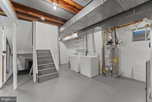 11866 S Lakes Ct, Reston, VA 20191 - unfinished below grade area with gas water heater, independent washer and dryer, and stairs