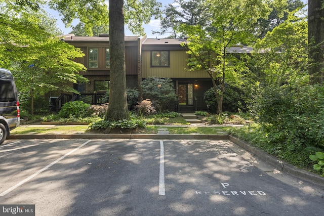 11866 S Lakes Ct, Reston, VA 20191 - multi unit property featuring uncovered parking and brick siding
