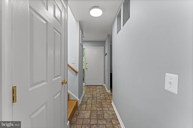 11866 S Lakes Ct, Reston, VA 20191 - hall with stone tile flooring and baseboards