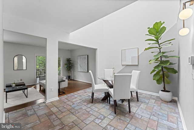 11866 S Lakes Ct, Reston, VA 20191 - dining space with baseboards and stone tile floors